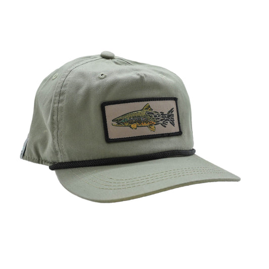 light green full cloth hat with black rope showing a brown trout on the patch that transitions into flies
