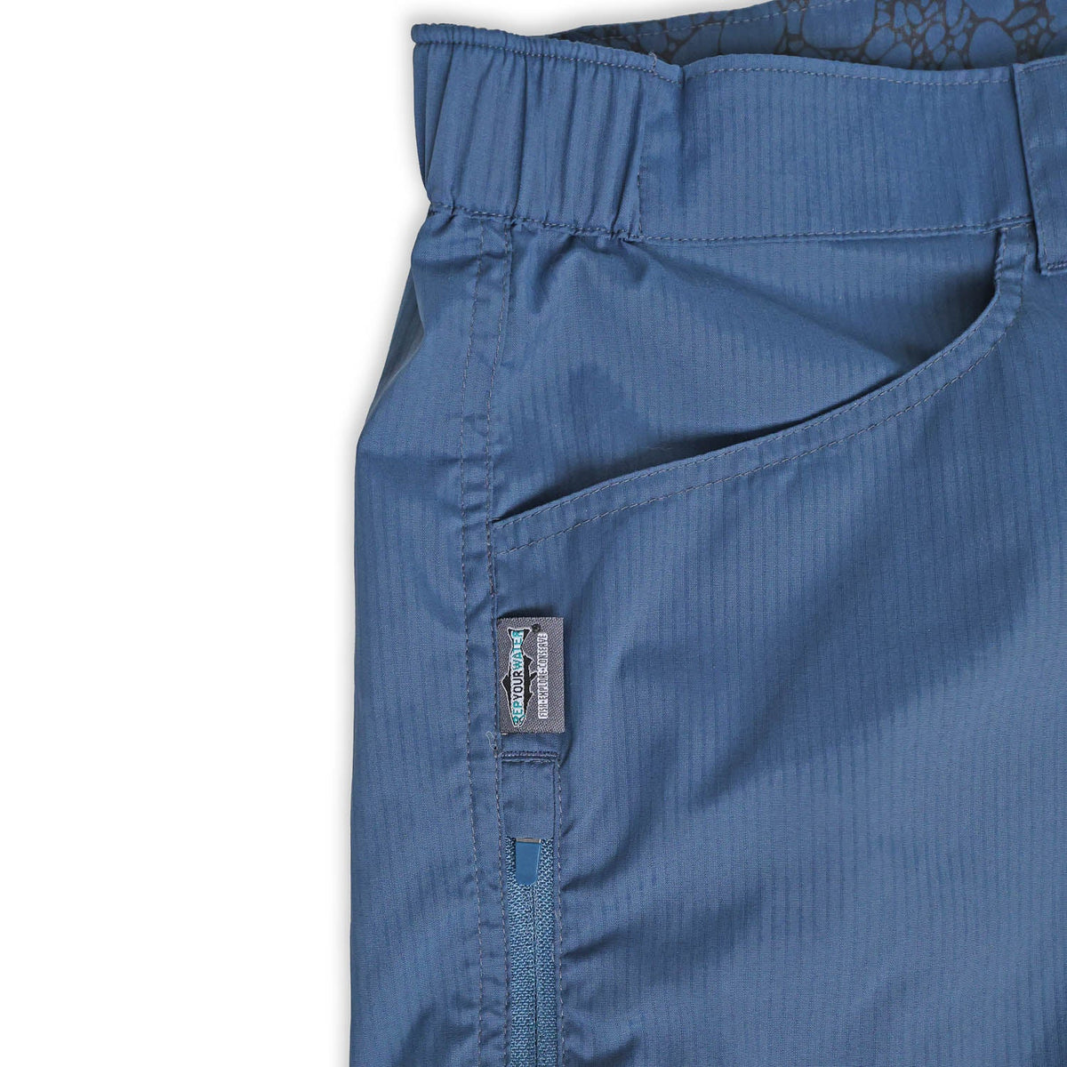 Close-up of blue short with a white background