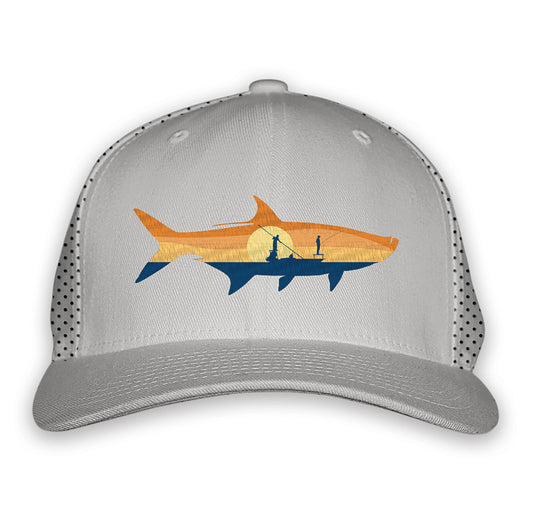 light gray front and nylon emsh back with a tarpon silhouette of a sunrise and two people on a boat fishing