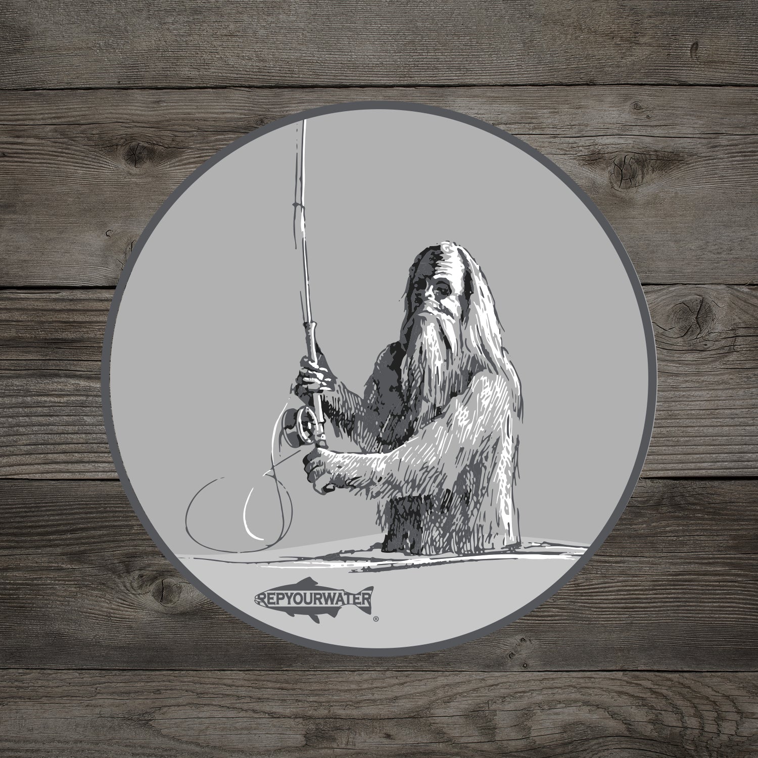 A sticker on a wood background that features a sasquatch casting a spey rod